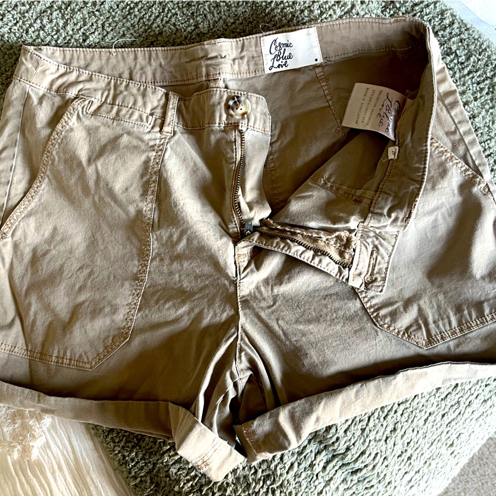 Worn relaxed khaki shorts